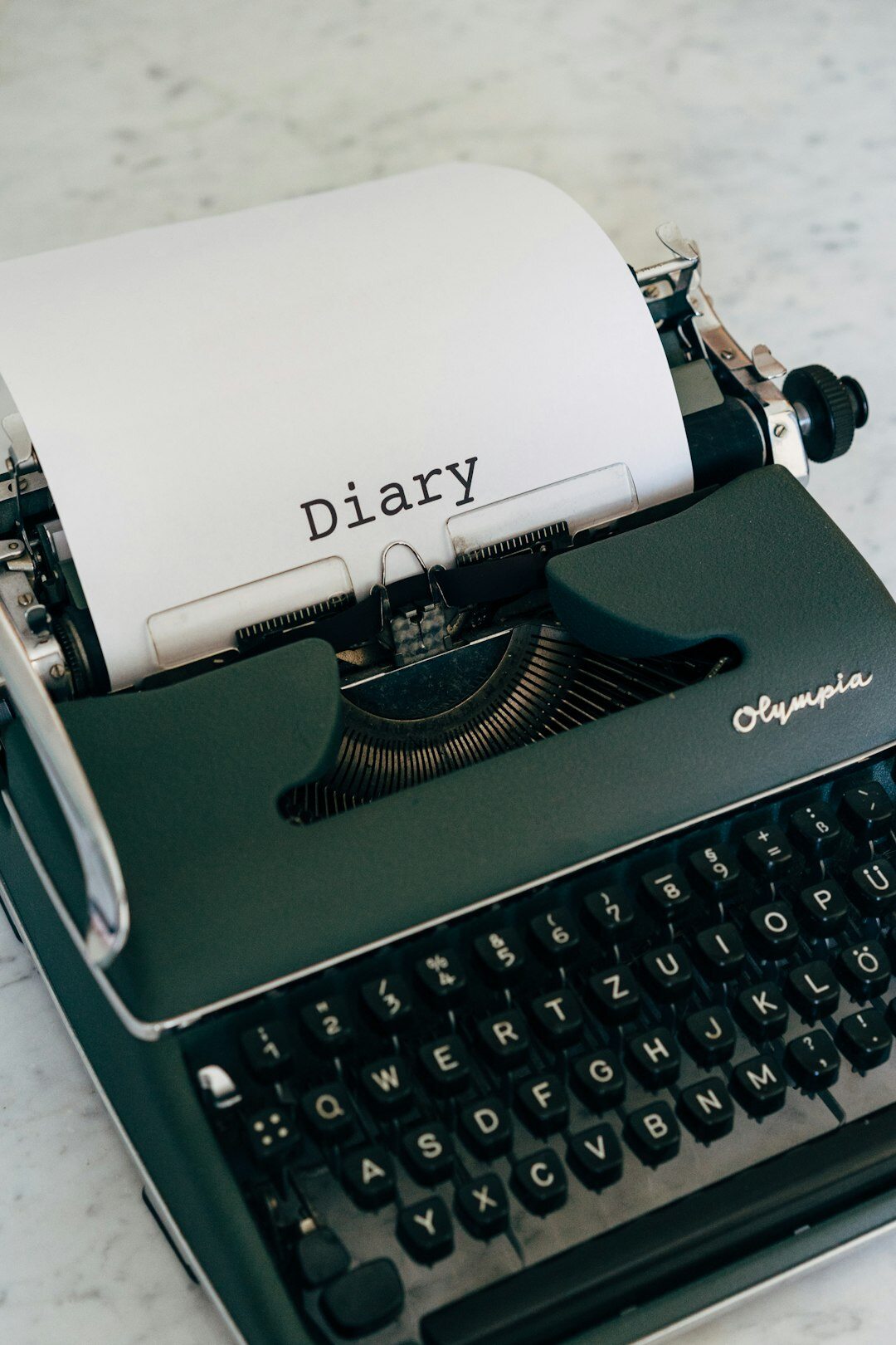 vintage typewriter with paper